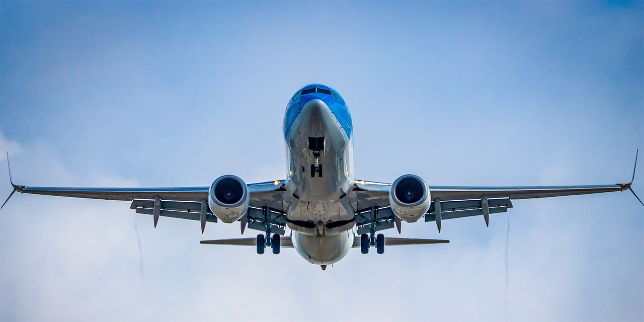 Airplane in blue sky